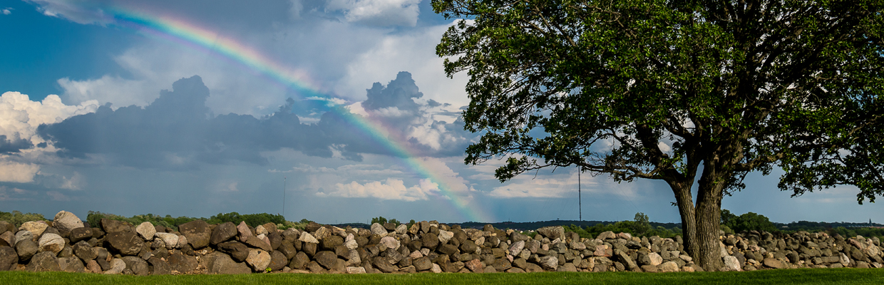 Slideshow rainbow stone fence